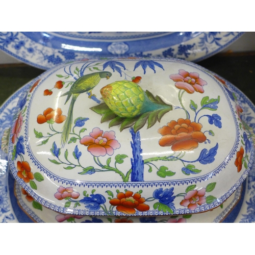 757 - Two blue and white ceramic serving plates and an ironstone china soup tureen with lid and stand, a/f... 