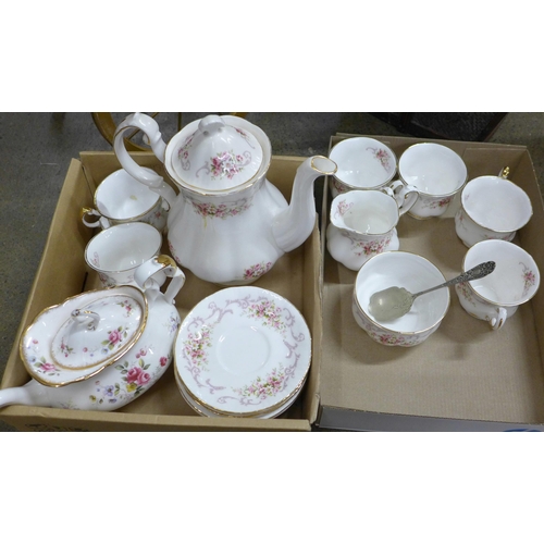 761 - A Paragon Rose Bouquet tea set, (6 settings), a Chinese Wedding basket, and a wicker dolls pram