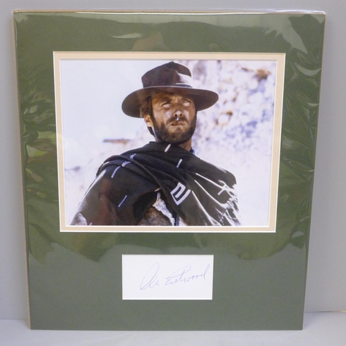 766 - A Clint Eastwood autographed display, (no COA)