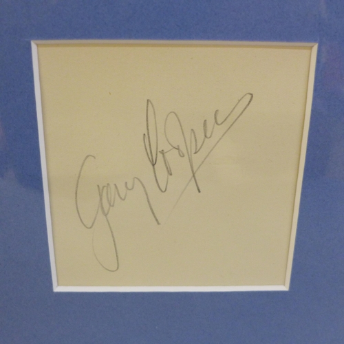 772 - A Gary Cooper autographed display, (no COA)