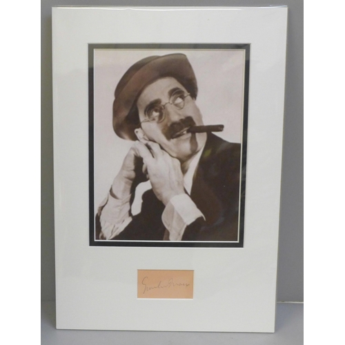 774 - A Groucho Marx autographed display, (no COA)