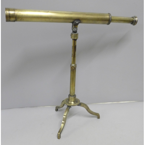 780 - A Stanley London brass telescope on stand