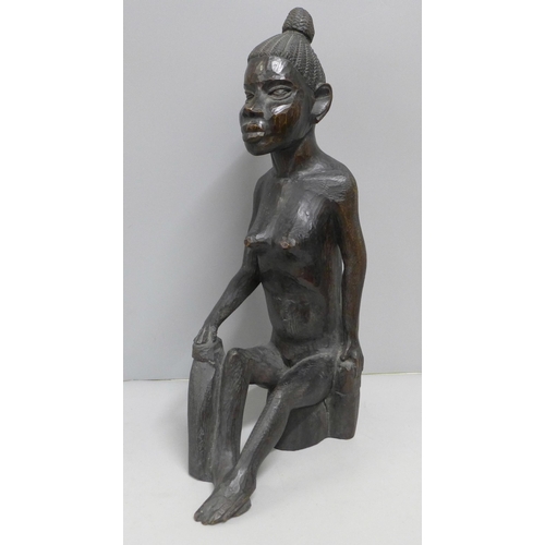 789 - A carved wooden African figure, 40.5cm