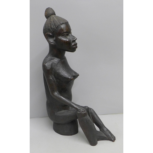 789 - A carved wooden African figure, 40.5cm