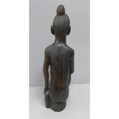 789 - A carved wooden African figure, 40.5cm