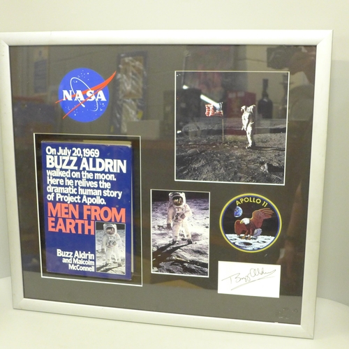 791 - A Buzz Aldrin autographed display with book and Apollo 11 cloth badge, with COA