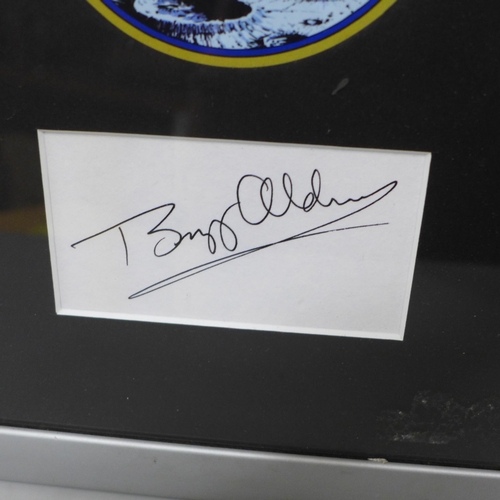 791 - A Buzz Aldrin autographed display with book and Apollo 11 cloth badge, with COA