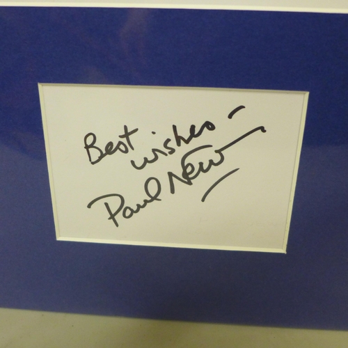 793 - A Paul Newman autographed display, (no COA)