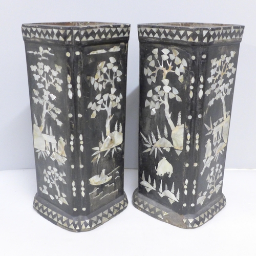 795 - A pair of Oriental square vases inlaid with mother of pearl, chipped, 27.5cm