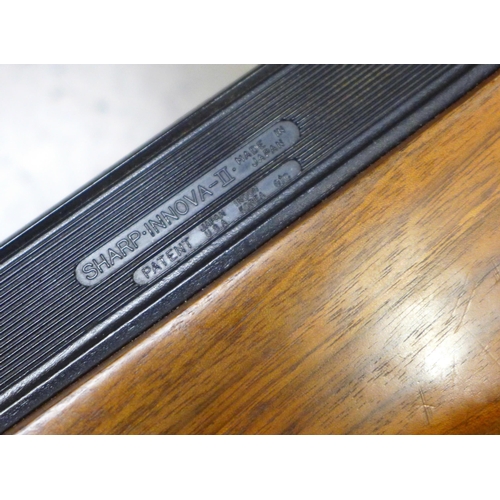 811 - An APB Venom customised air rifle, walnut stock, missing parts