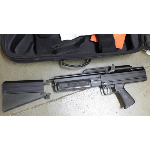 812 - A Skan A.R. pump action air gun with soft case, needs repair