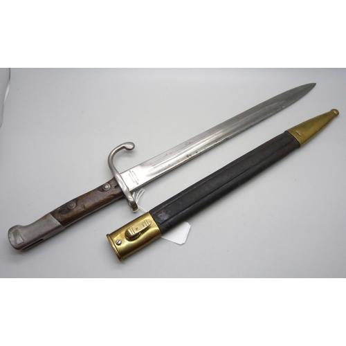 823 - A German bayonet, the blade marked Weyersberg Kirschbaum & Cie., Solingen, with scabbard