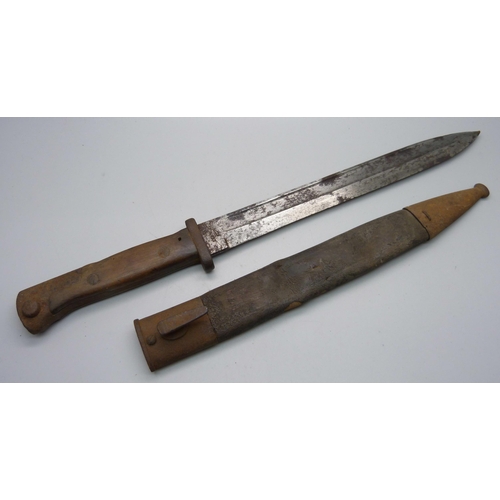 824 - A German bayonet, the blade marked Weyersberg Kirschbaum & Cie, Solingen and Erfurt, with scabbard, ... 