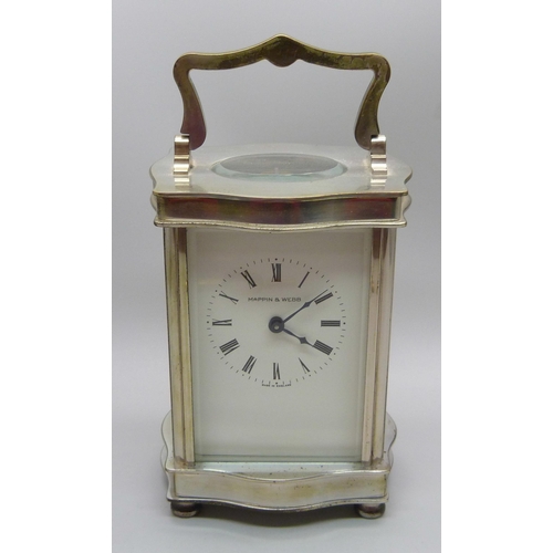 837 - A Mappin & Webb carriage clock with key