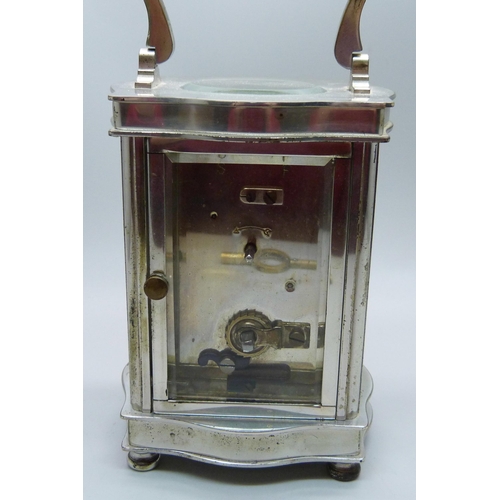 837 - A Mappin & Webb carriage clock with key