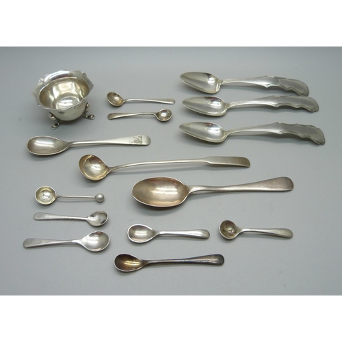 847 - A collection of silver condiment spoons, four other silver spoons and a silver salt, 111g