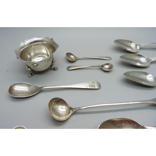 847 - A collection of silver condiment spoons, four other silver spoons and a silver salt, 111g