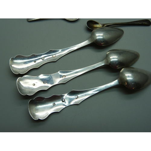 847 - A collection of silver condiment spoons, four other silver spoons and a silver salt, 111g