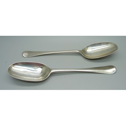 848 - A pair of early silver rattail serving spoons, maker I.W. for John Wakelin, 102g