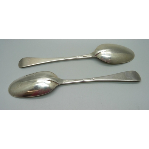 848 - A pair of early silver rattail serving spoons, maker I.W. for John Wakelin, 102g