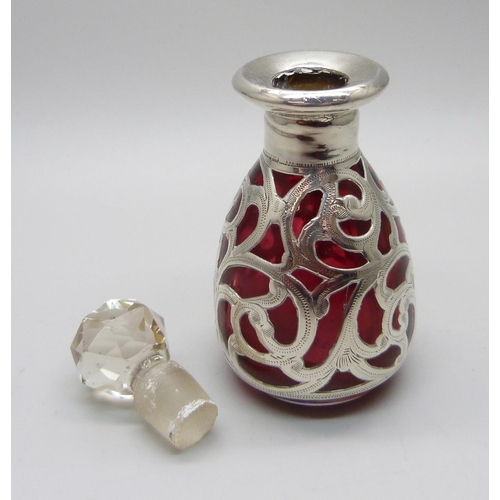 854 - A cranberry glass bottle with 925 silver overlay, 80mm