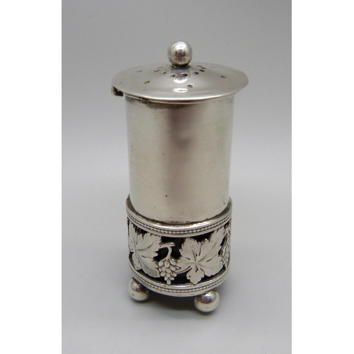 857 - An A.E. Jones silver pepper with green glass liner, Birmingham 1908, 43g