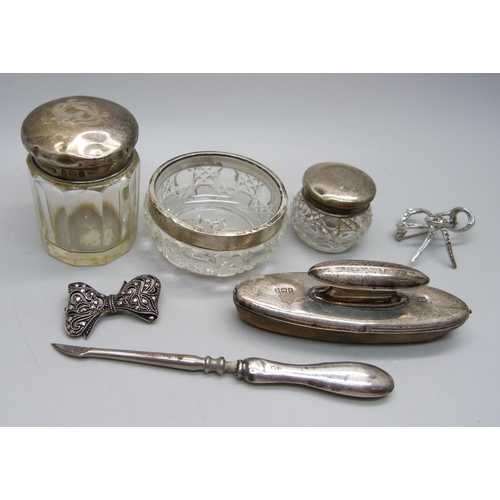 872 - Silver items, nail buff, two silver topped jars, marcasite brooch, etc.