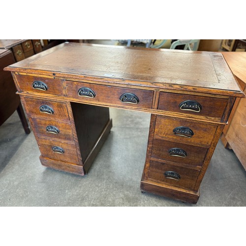 300 - A Victorian oak pedestal desk