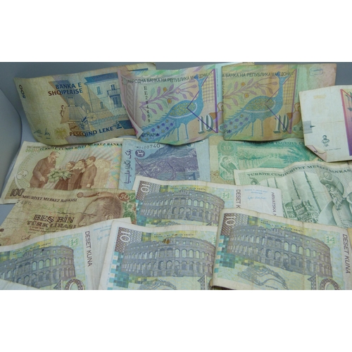 875 - A collection of worldwide bank notes