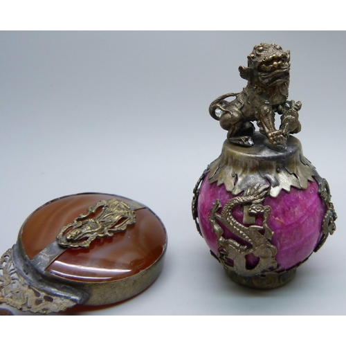 876 - A Chinese agate set pendant and a dog of foe mounted on a ball