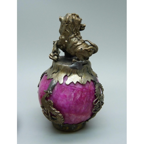 876 - A Chinese agate set pendant and a dog of foe mounted on a ball