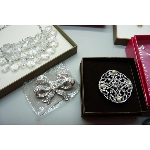 884 - Butler and Wilson statement jewellery, (3), other brooches, pendant and chain, etc.