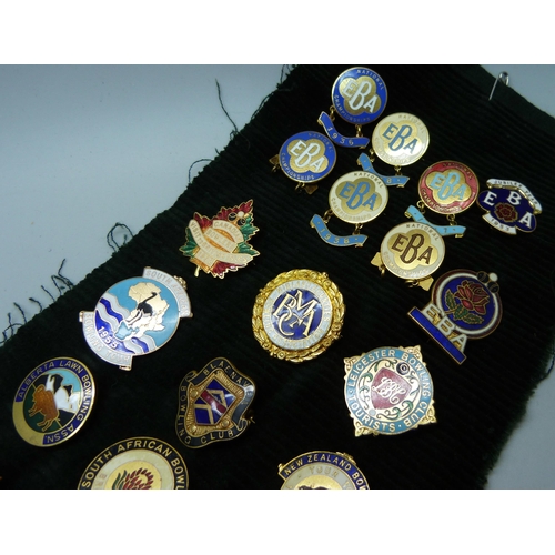 903 - A collection of 55 bowling badges