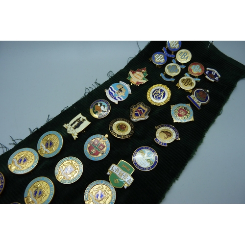 903 - A collection of 55 bowling badges