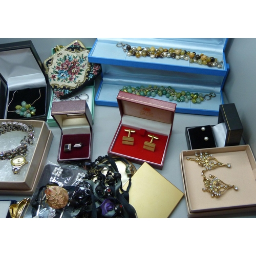 925 - A collection of costume jewellery including a pair of silver cufflinks, other silver jewellery, lady... 