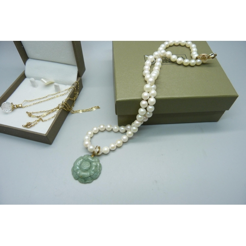 929 - A 9ct gold and crystal pendant and chain, (chain 2.1g) and a pearl necklace with jade pendant and 14... 