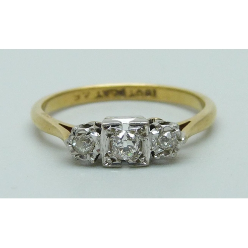 934 - An 18ct gold Art Deco three stone diamond ring, 2.7g, N