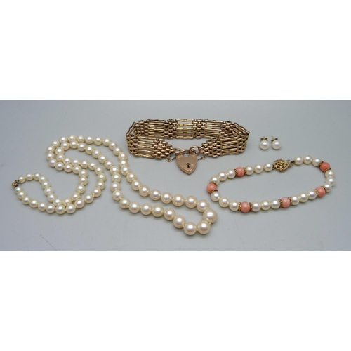 948 - A 9ct gold gate bracelet, 20.2g, a pearl and coral bracelet with 9ct gold clasp, a pearl necklace an... 