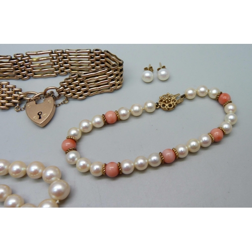 948 - A 9ct gold gate bracelet, 20.2g, a pearl and coral bracelet with 9ct gold clasp, a pearl necklace an... 