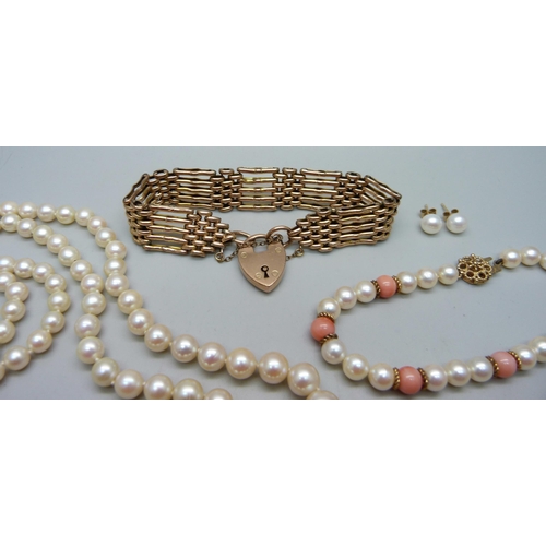 948 - A 9ct gold gate bracelet, 20.2g, a pearl and coral bracelet with 9ct gold clasp, a pearl necklace an... 