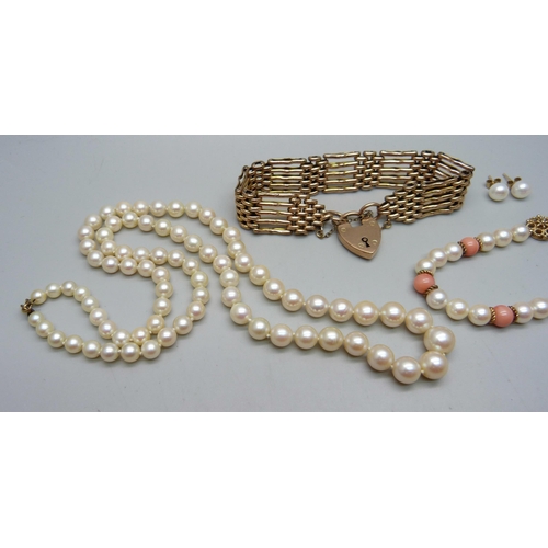 948 - A 9ct gold gate bracelet, 20.2g, a pearl and coral bracelet with 9ct gold clasp, a pearl necklace an... 