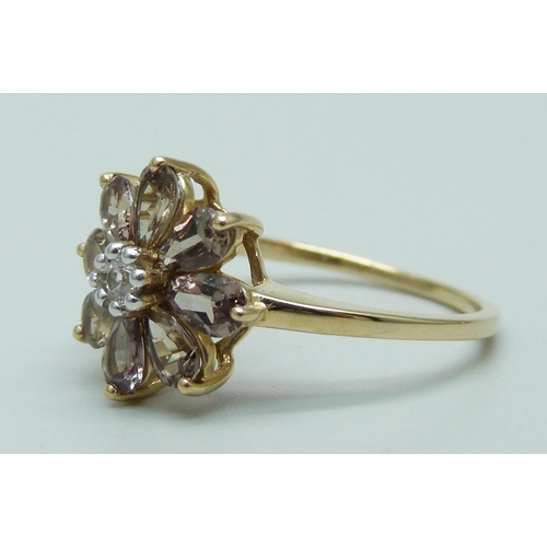 949 - A 9ct gold, colour change garnet and white sapphire cluster ring, with certificate, 2.7g, S