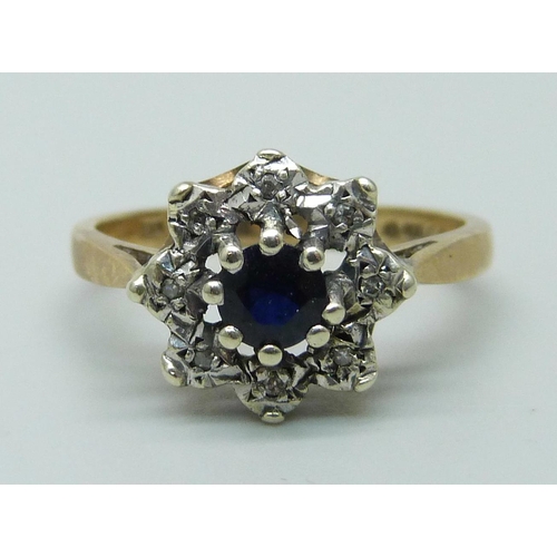 962 - A 9ct gold, sapphire and diamond cluster ring, 3.2g, P