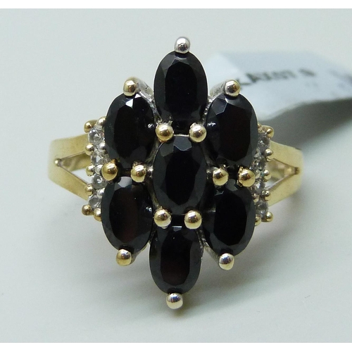 966 - A silver gilt black spinel and white topaz cluster ring, S