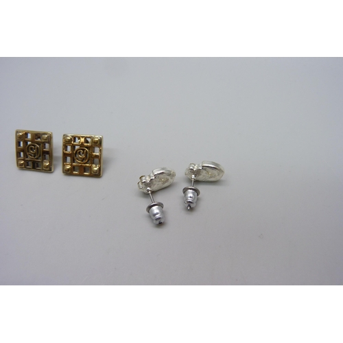 970 - A pair of silver gilt earrings and one other pair of earrings