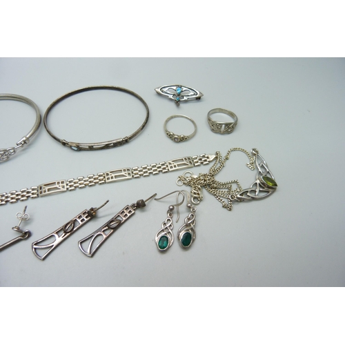 977 - A collection of silver jewellery including bangles, earrings, necklaces, etc.