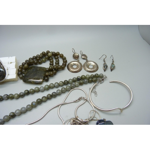 988 - A collection of silver jewellery, silver mounted jewellery and two bead necklaces