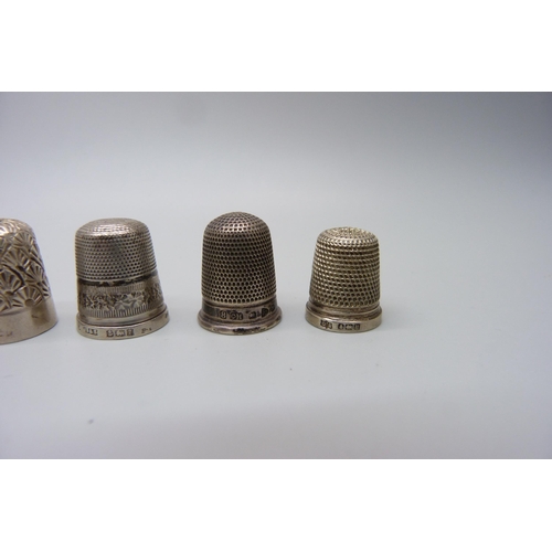 991 - A collection of eight silver thimbles including one Charles Horner, one in a fitted thimble box, two... 