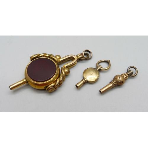 994 - A swivel fob watch key and two other watch keys