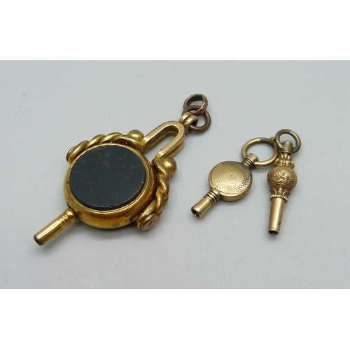 994 - A swivel fob watch key and two other watch keys